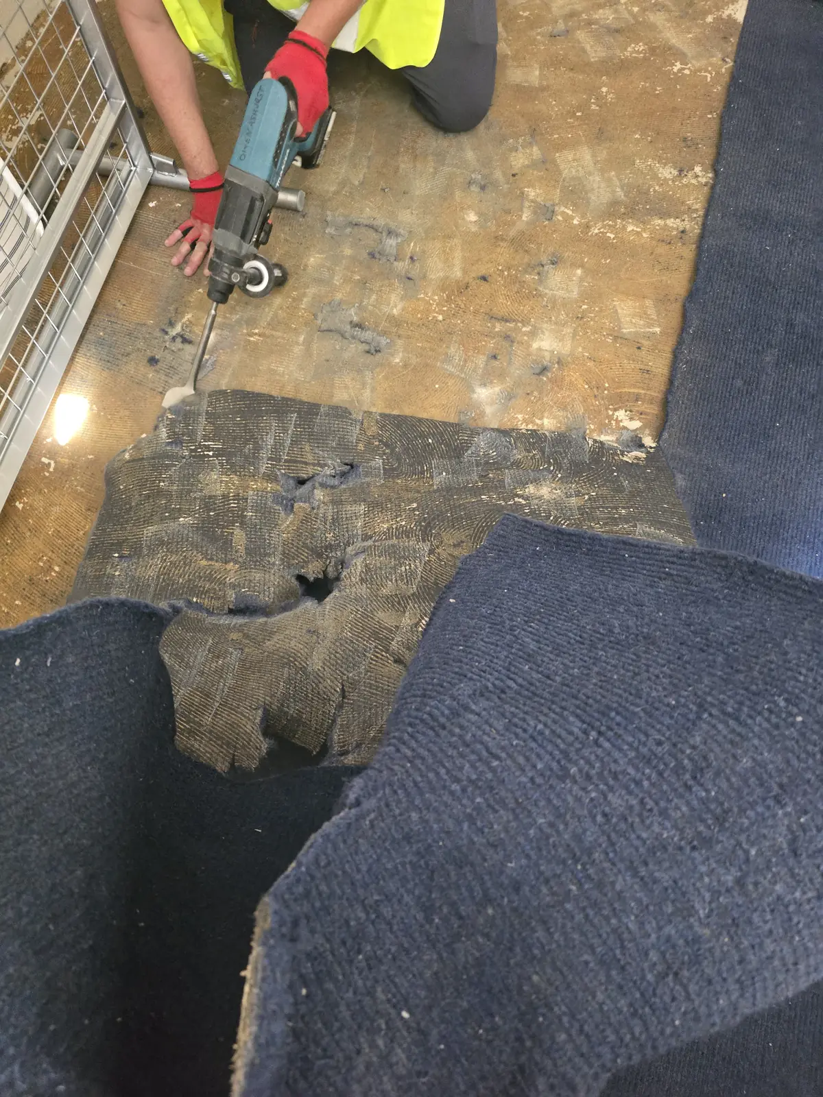 Breaking up old flooring back to the bare floor