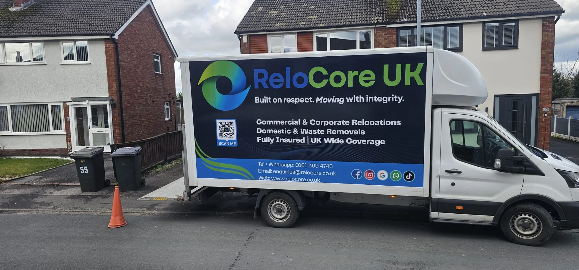 ReloCore UK Luton van parked outside a semi-detached family home on moving day